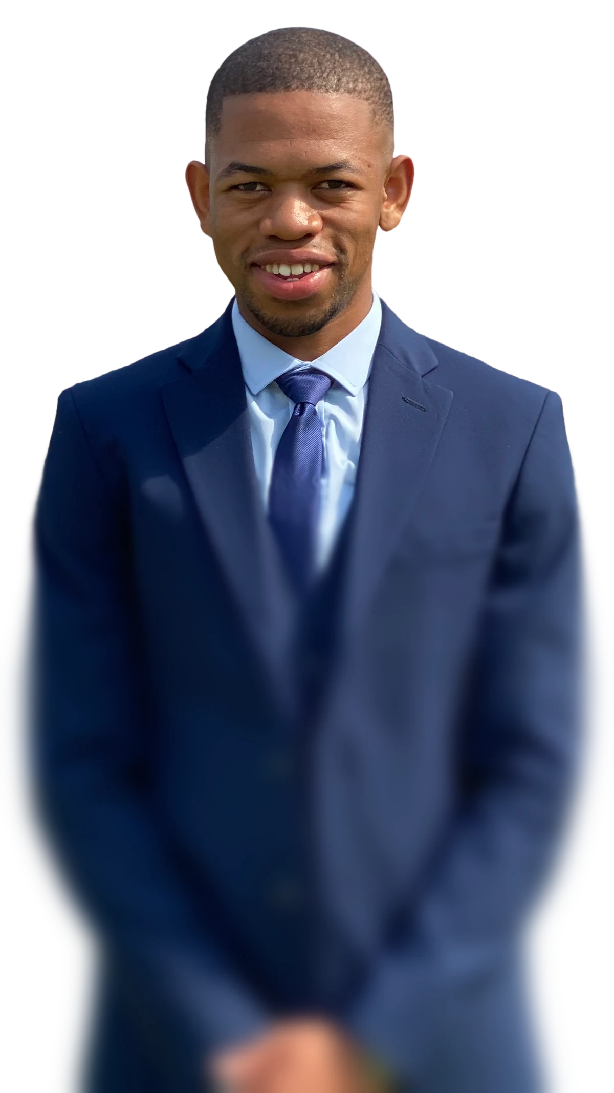 Olwethu Mbanjwa in a navy three-piece suit, smiling